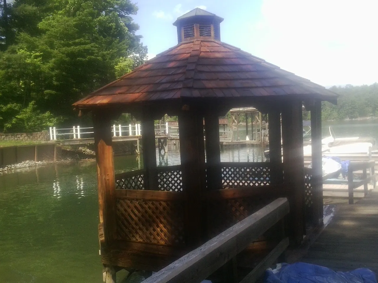 Cedar shake gazebo roof rebuilt on a lake dock in Island Heights